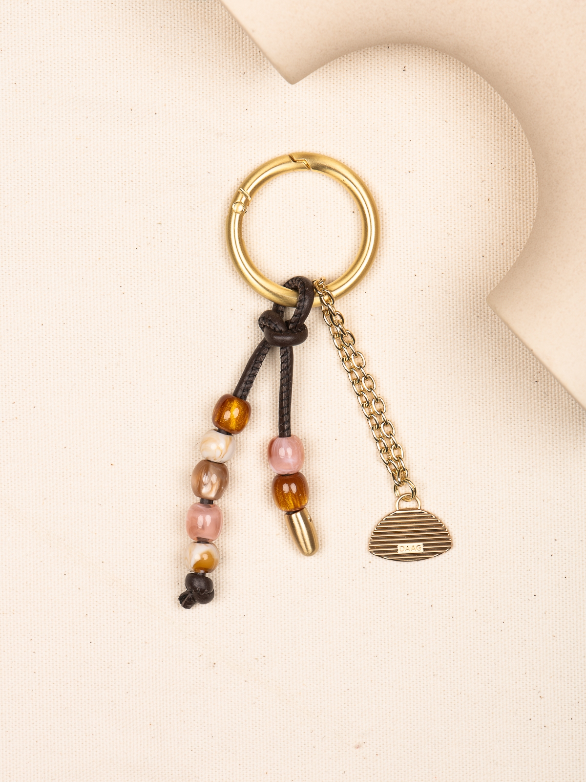 CHARMS koraliki troczek czekoladowy skórzany breloczek.jpg